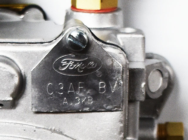 detail of carburetor number on Ford 4100 carburetor